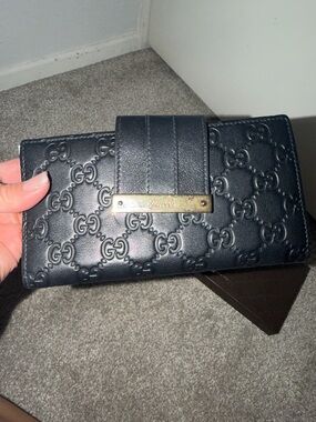 Gucci Black Embossed GG Leather Wallet with Gold Plate